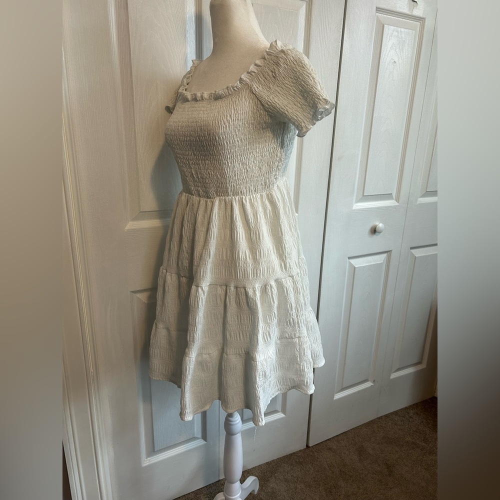 White Mini Sundress with Tiered Skirt and Off-the-Shoulder Neckline - Picture 6 of 12